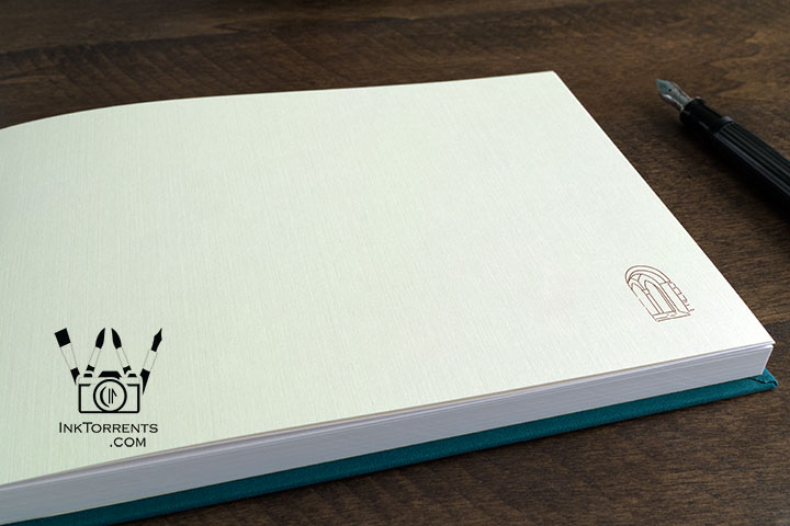 Full view of the open lay-flat journal showing linen endpaper matching the Dryburgh Abbey cover art by InkTorrents Graphics
