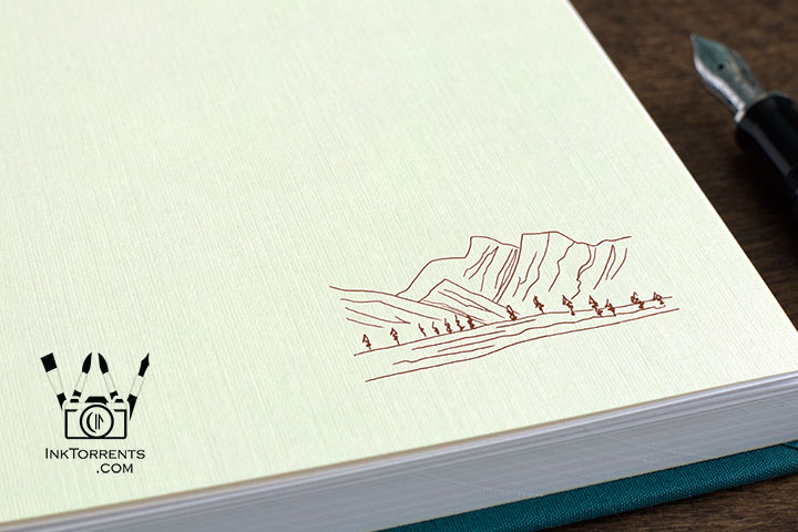 Close-up of linen endpaper with sepia mountain art for Sierra Hot Springs notebook — InkTorrents Graphics