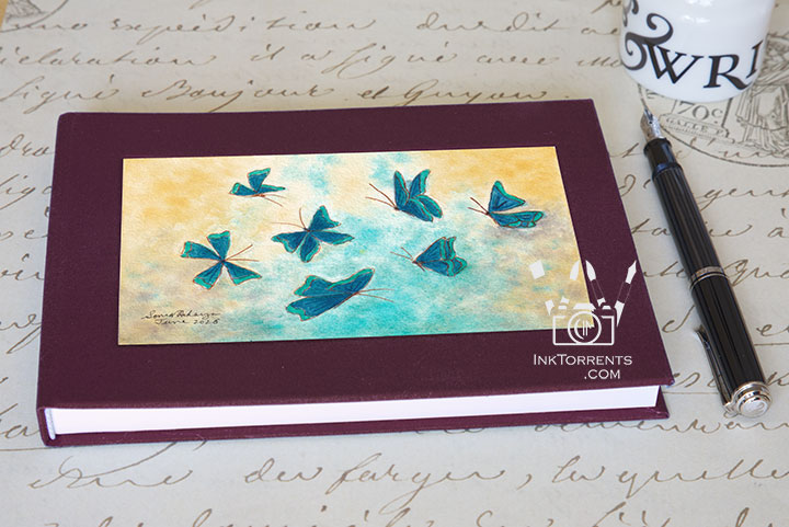 Dusk Red cloth-bound layflat notebook with The Blue Butterfly Effect art — InkTorrents Graphics