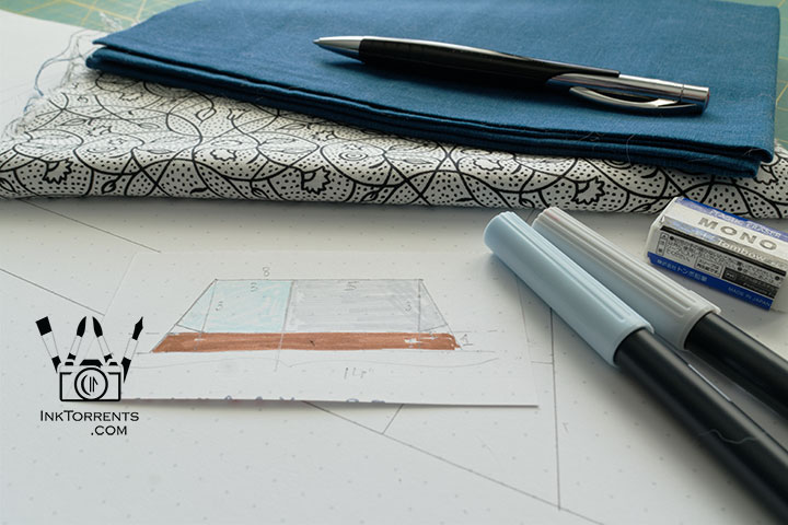 Handmade triangular zippered pencil case in printed cotton and faux leather, self-drafted pattern, by InkTorrents Graphics